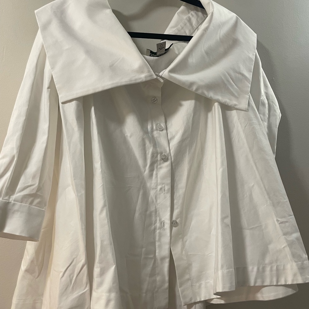Andrés Otalora white off shoulder button down